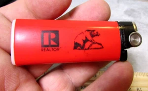 vintage B&A Realtors Fairbanks Alaska souvenir Lighter -Red - sparks but no fuel - Picture 1 of 3