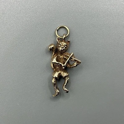 Dije de gato y violín de oro de 9 quilates Foto 1 de 4