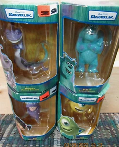 DISNEY PIXAR MONSTERS INC ENESCO SET OF 4 SULLY , MIKE , RANDALL , BOO , SEALED - Picture 1 of 11
