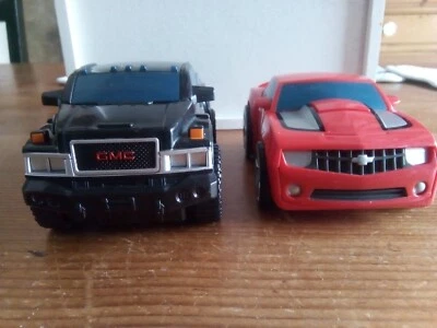 TRANSFORMERS BUMP-N-GO VOITURES OPTIMUS PRIME ET 1 AUTRE - Photo 1/4