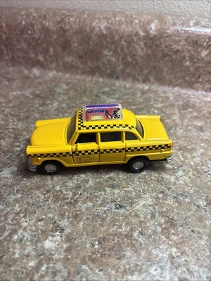 Литая модель такси Schilling желтое такси New York Times Square игрушка Pull Back & Go - Изображение 1 из 4