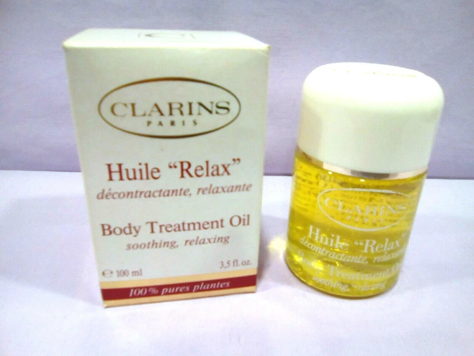CLARINS HUILE RELAX 100% PURES PLANTES / BODY TREATMENT OIL 100 ML. - Immagine 1 di 1
