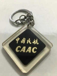Vintage CAAC Civil Aviation Administration of China LUCITE SCHLÜSSELANHÄNGER  - Bild 1 von 2