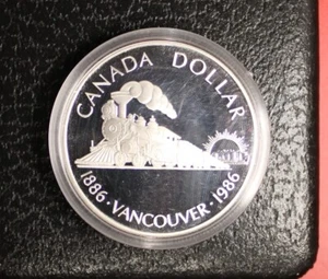1986  SILVER CANADIAN DOLLAR VANCOUVER TRANSCONTINENTAL TRAIN IN CASE #PSA14 - Picture 1 of 10