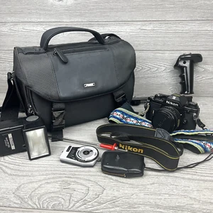 Nikon EM 35mm SLR Film Camera w 50mm 1.8 Nikon Series E Lens Bag and Accessories - Picture 1 of 21