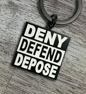 Deny, Defend, Depose Metal Keychain – Activist Enamel Design Accessory - Foto 1 di 2