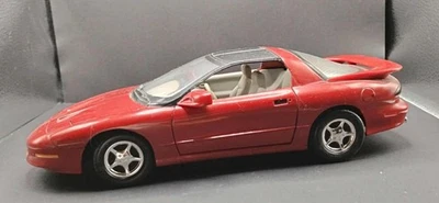 ERTL American Muscle 1:18 die-cast model of a 1996 Pontiac Firebird Trans Am - Image 1 of 4