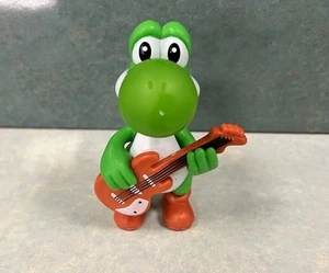 Yoshi Guitar Actionfigur NEU New Nintendo Super Mario Gitarre - Bild 1 von 6