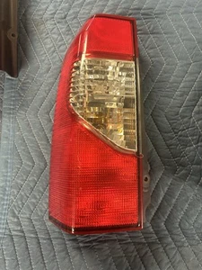 2000-2001 Xterra Driver Side Taillight Assembly - Picture 1 of 2