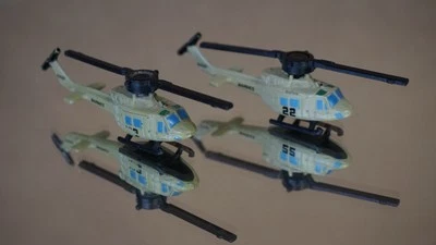 Set of 2 Military Micro Machines Bell UH-1H Helicopters - Image 1 of 4