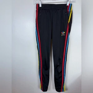 Pantalones deportivos Adidas vintage para mujer edición limitada talla XS negros rojos azules amarillos - Imagen 1 de 12