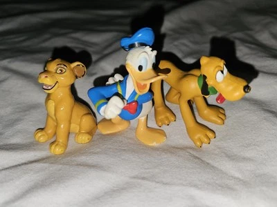 Figuras de Disney Play, adornos para pasteles, juguetes - Donald. Plutón y Nala Foto 1 de 3