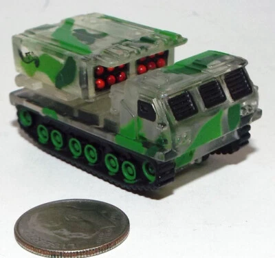 Pequeño Mini Hot Wheels Plástico M-270 MLRS en Camuflaje Transparente y Verde Foto 1 de 4