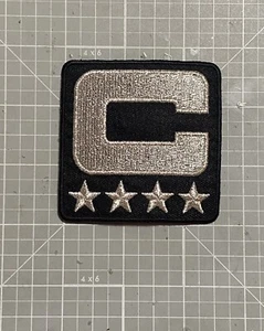 OAKLAND FOOTBALL JERSEY PATCH METALLIC SILVER & BLACK 4 STAR TEAM CAPTAIN NEW🔥 - Picture 1 of 2