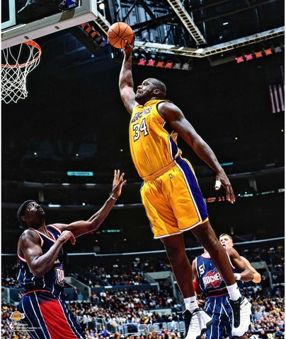 Shaquille O'Neal Los Angeles Lakers Unsigned Yellow Jersey Dunking Photograph Cover