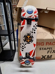 Skateboard mit Helm - Bild 1 von 5