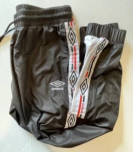 Pantalones deportivos Umbro de nailon con cordón para niños talla pequeña S - Imagen 1 de 8