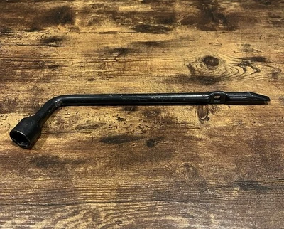 Nissan Pathfinder 2005-2025 Llave de tuerca de rueda de repuesto Herramienta de hierro para neumáticos OEM ✨✨✨ Foto 1 de 3