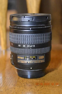 NIKON 18-70mm LENS IN EXC COND WORKS WELL w/2 caps +UV FILTER - Picture 1 of 9