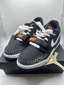 Nike jordan size 5 legacy 312 low Boys Trainers Brand New, Black Orange And Grey - Picture 1 of 9