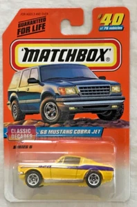 MATCHBOX 68 MUSTANG COBRA JET YELLOW CLASSIC JAHRZEHNTE - VINTAGE 1997 - BRANDNEU - Bild 1 von 7