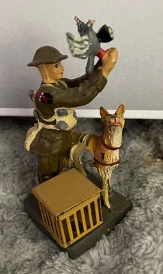 Toy soldier w/ dog, pigeon cage and pigeon W/ camera 593 produced Hausser German - Image 1 of 4