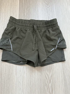Pantalones Cortos para Correr Avia Para Mujer Pequeños Forrados en Verde Cintura Elástica Cordón - Imagen 1 de 3