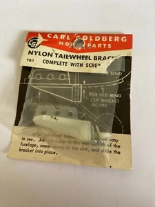 VINTAGE CARL GOLDBERG T81 NYLON TAILWHEEL BRACKET COMPLETE WITH SCREW  - Picture 1 of 2