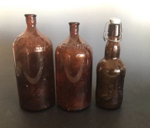 Brown Embossed Glass Bottles Lot of 3 Two Clorox and One Grolsch - Picture 1 of 12