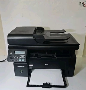 Impresora láser todo en uno multifunción HP LaserJet Pro M1212nf. Bajo número de páginas. Tóner nuevo. - Imagen 1 de 9
