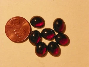 Granat 7 von ca. 9x11 mm Oval Cab rot lila einige natürliche Einschlüsse - Bild 1 von 2