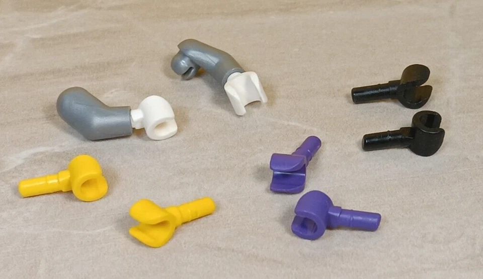 LEGO Silver Arm Set Lot of 4 Extra Replacement Hands Black Purple Yellow White - Image 1 of 1