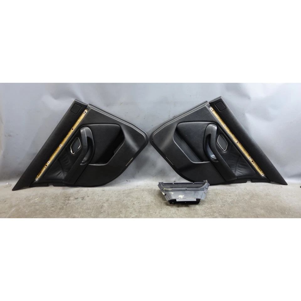 Par de molduras de panel de puerta trasera BMW E39 serie 5 97-03 dañado pantalla de cuero negro OEM Foto 1 de 4