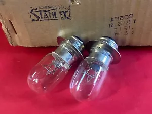 STANLEY • NOS 12V 25/25W HeadLight Bulb Set 2pc Yanmar YM 240 330 1500 2500 3000 - Picture 1 of 2
