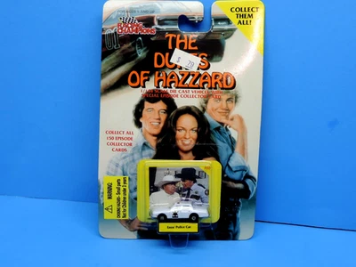 CAMPEONES DE CARRERAS DUQUES DE HAZZARD ENOS COCHE PATRULLA DE POLICÍA ESCALA 1:144 Foto 1 de 4