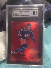 2021 Skybox Metal Universe Cole Sillinger Retro PMG Red /100 RC Blue Jackets 