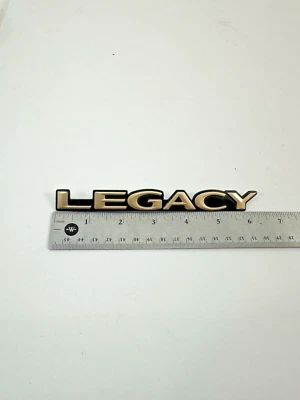 1995-1999 Subaru Legacy Outback AWD Emblem Logo Letters Badge Trunk End Gate OEM - Image 1 of 4