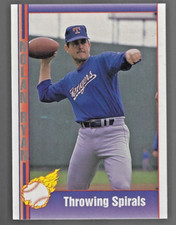 1991 Pacific NOLAN RYAN Rangers "Throwing A Football"  Baseball Card #77