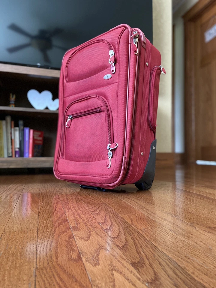 Red Olympia Luggage Suitcase With Wheels And Retractable Handle - Image 1 of 4