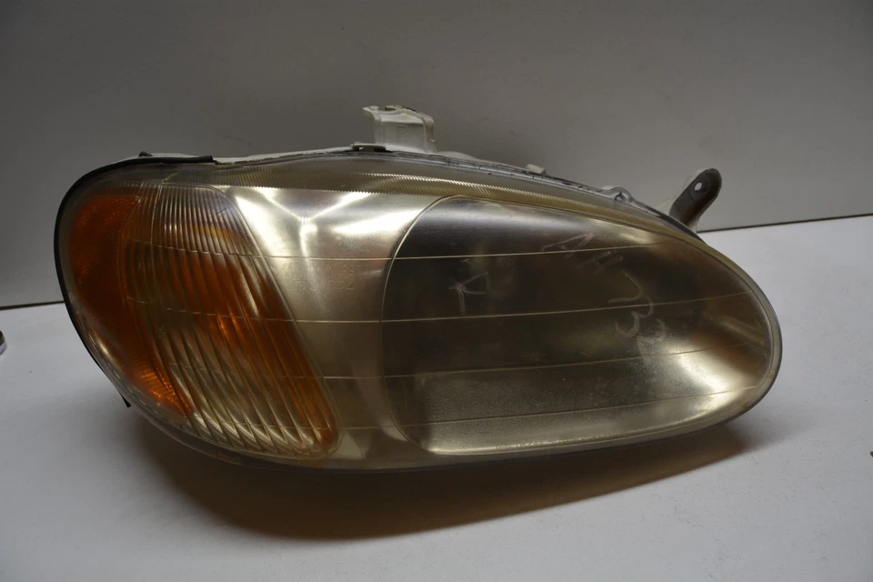 1998 - 2001 KIA SEPHIA FAROL DO LADO DIREITO DO PASSAGEIRO FABRICANTE DE EQUIPAMENTO ORIGINAL, 114-60054 - Imagem 1 de 4