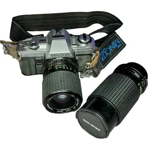 MINOLTA X-370 fotocamera reflex pellicola con cinturino, obiettivo cinque stelle 75 mm e 200 mm - Foto 1 di 12