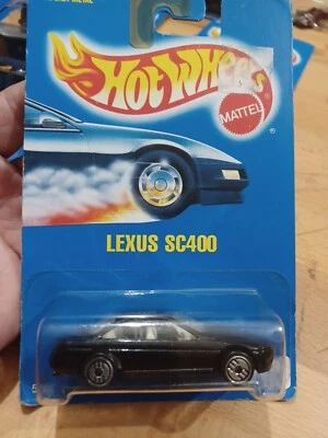 Tarjeta azul HotWheels 1991, Lexus SC400 #209 difícil de encontrar rara negra.  Foto 1 de 4