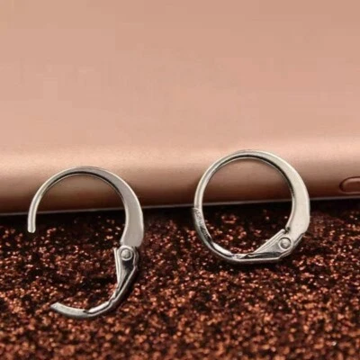 Orecchini a cerchio color argento, 25 pz/lotto, mai indossati - Immagine 1 di 2