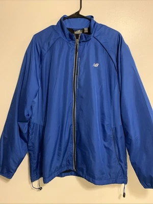 Chaqueta cortavientos New Balance poliéster azul para hombre talla XL cremallera completa Foto 1 de 3