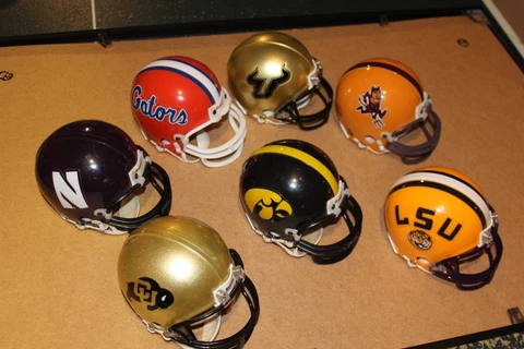 Riddell mini football helmet 3 5/8 NCAA Used - Displayed in a smoke free office Cover