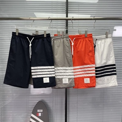 Pantalones Cortos Thom Browne Hombre/Mujer Verano Nuevos Informales Deportes Cuatro Barras Rayas Foto 1 de 4