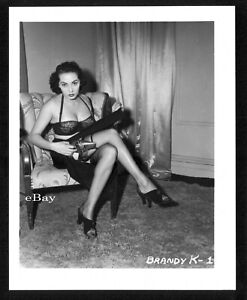 Irving Klaw 4x5" photo. Sexy model: Brandy Kayse, with thigh gun holster.