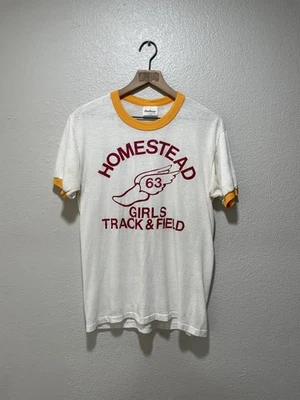 Camiseta Homestead Girls Track & Field 63 Timbre Blanca Naranja Talla S De Colección Años 80 Foto 1 de 4
