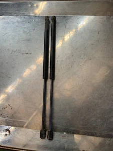 OEM 2009-2018 DODGE RAM 1500 FRONT HOOD PROP ROD SET LIFT SUPPORT RODS BARS BAR - Imagen 1 de 3