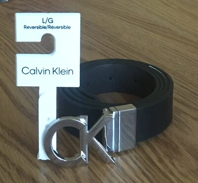 Talla L - Cinturón para mujer Calvin Klein reversible con logotipo CK negro/marrón (ver NOTA) Foto 1 de 4